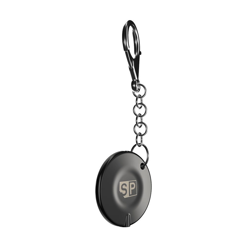 340007_Target_Swiss_Point_Key_Premium_2 Das Bild zeigt den "Target Swiss Point Key Premium", einen runden Schlüsselanhänger mit Kette und Karabinerhaken. Auf der Vorderseite ist ein "SP"-Logo sichtbar.