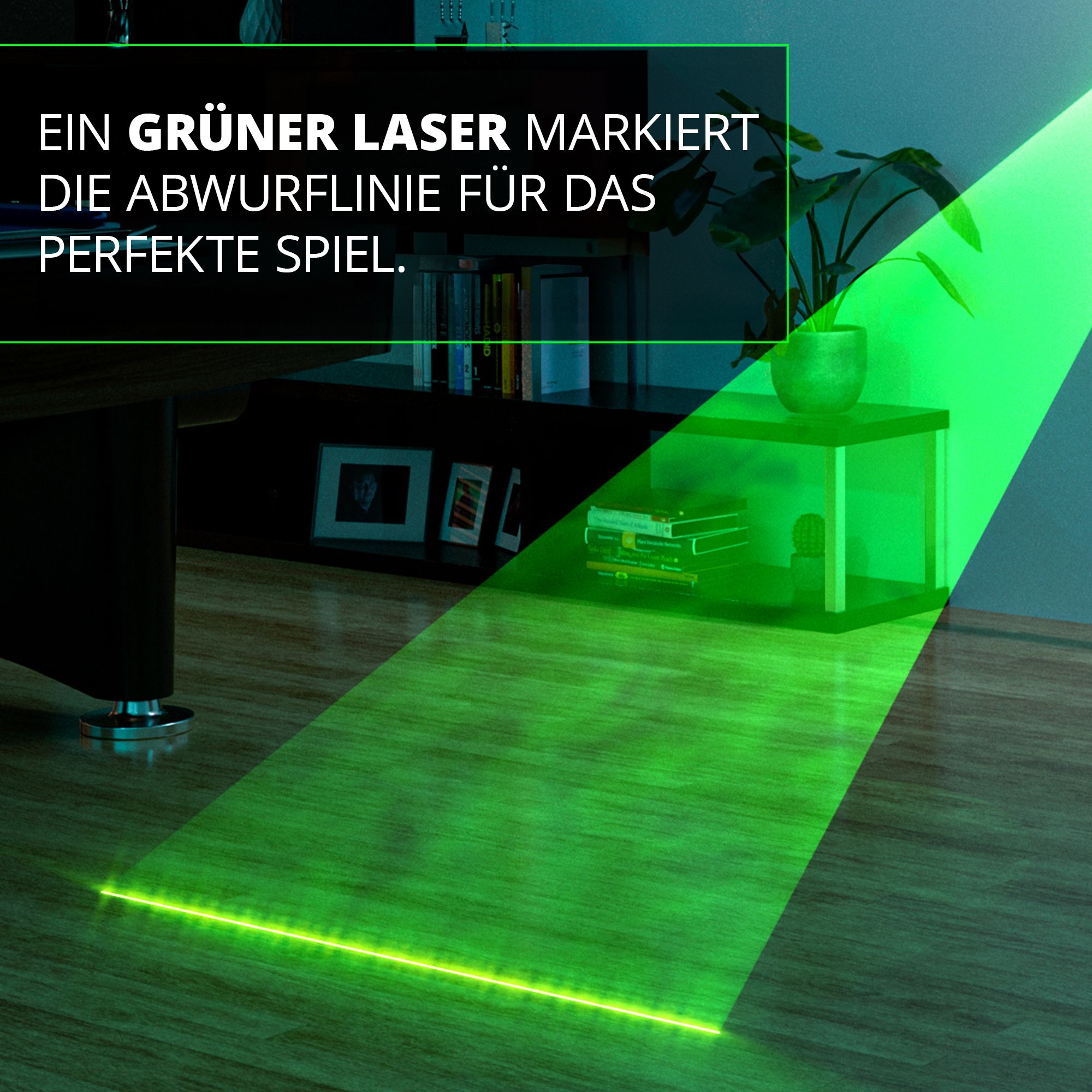 Target MOD Laser Oche Das Bild zeigt den Target MOD Laser Oche, der eine grüne Laserlinie auf den Boden projiziert. Der Laser markiert die Abwurflinie für das perfekte Dartspiel.
