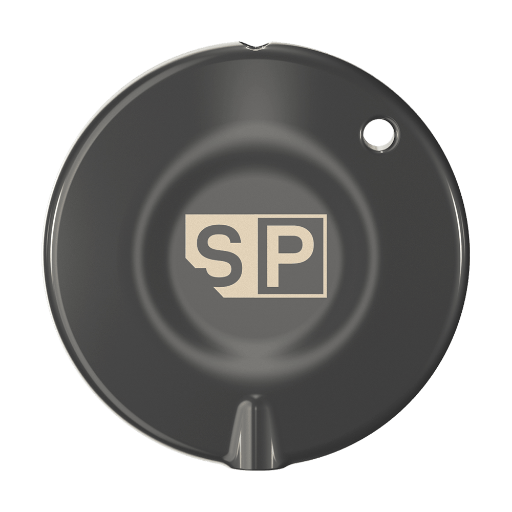 340007_Target_Swiss_Point_Key_Premium_1 Das Bild zeigt das Produkt "Target Swiss Point Key Premium". Es ist rund und schwarz mit einem "SP"-Logo in der Mitte.