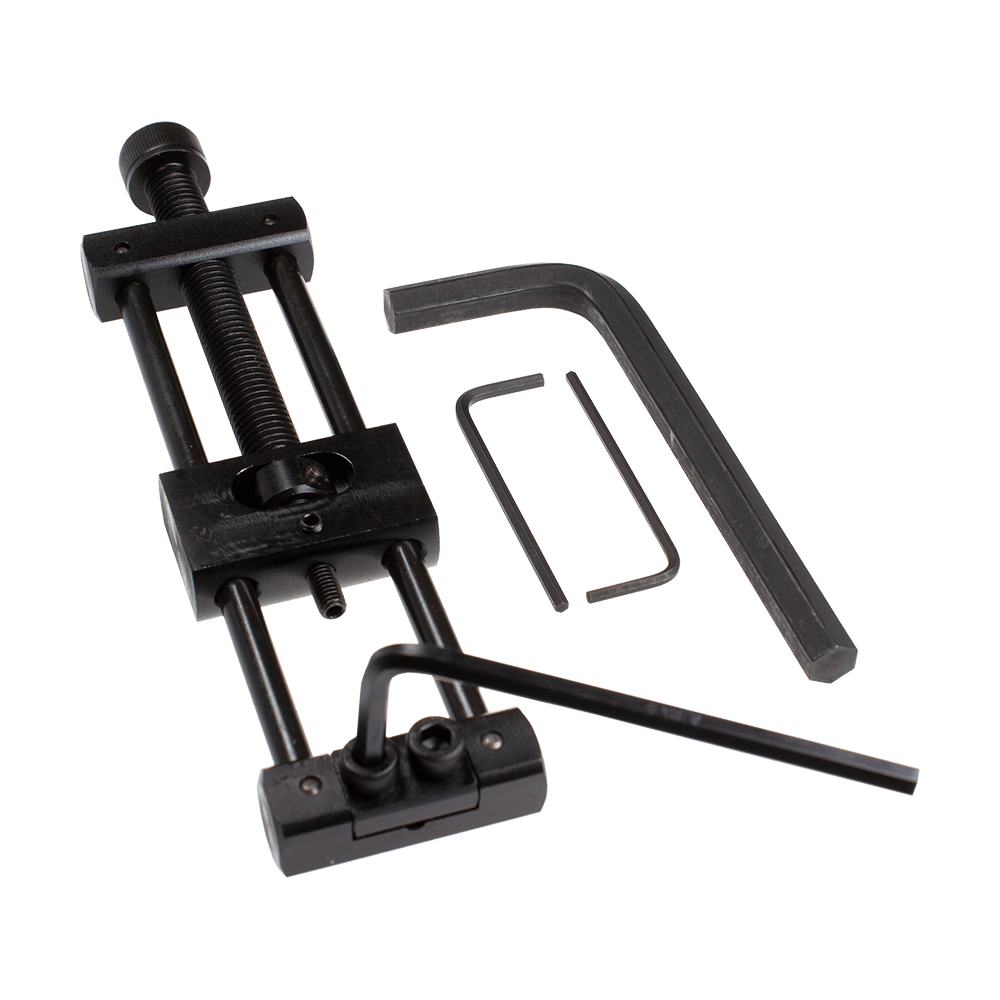 Designa Dart Repointer Black Pro Edition - Tip Changer Das Bild zeigt den Designa Dart Repointer Black Pro Edition - Spitzenwechsler. Es handelt sich um ein Werkzeug für Dartspieler zum Wechseln der Spitzen.