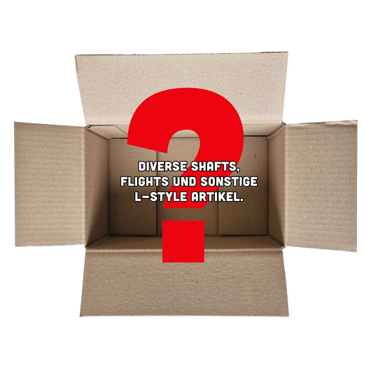 McDart Mystery Box - L-Style Das Bild zeigt einen offenen Karton mit einem großen roten Fragezeichen darin. In der Mitte steht der Text: "Diverse Shafts, Flights und sonstige L-Style Artikel."