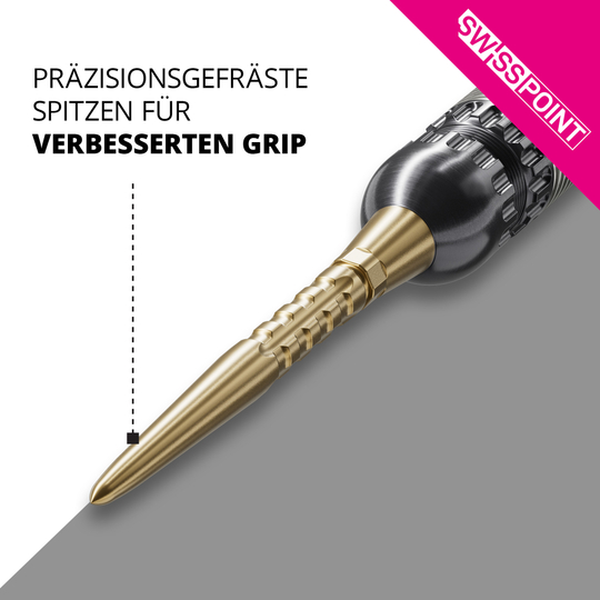 Das Bild zeigt eine goldene Steeldartspitze mit präzisionsgefräster Oberfläche. Im Text wird ein verbesserter Grip durch diese spezielle Spitze hervorgehoben.